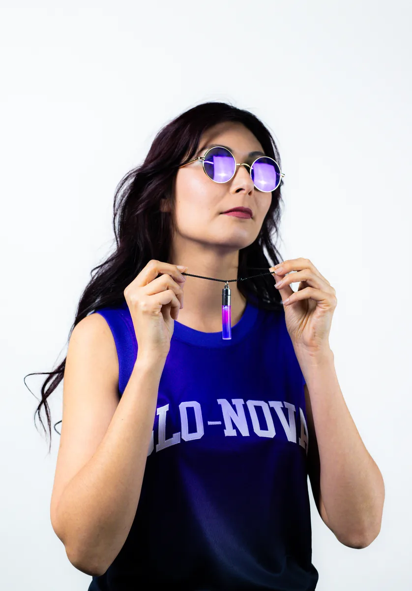 Model wearing a Purple Haze GloNova pendant
